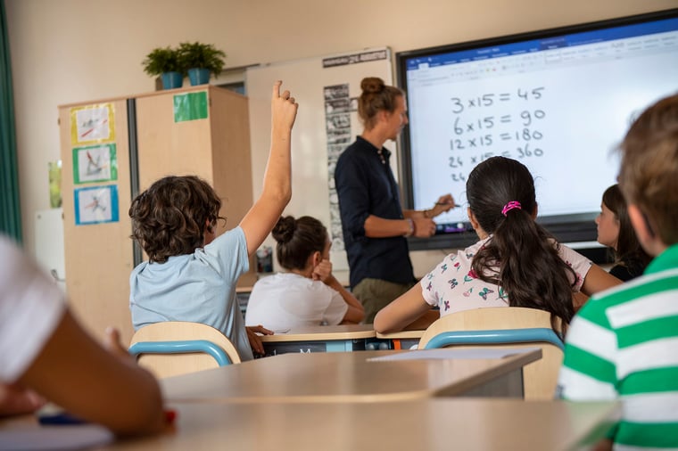 group-of-students-paying-attention-to-their-teache-2024-03-01-14-27-54-utc